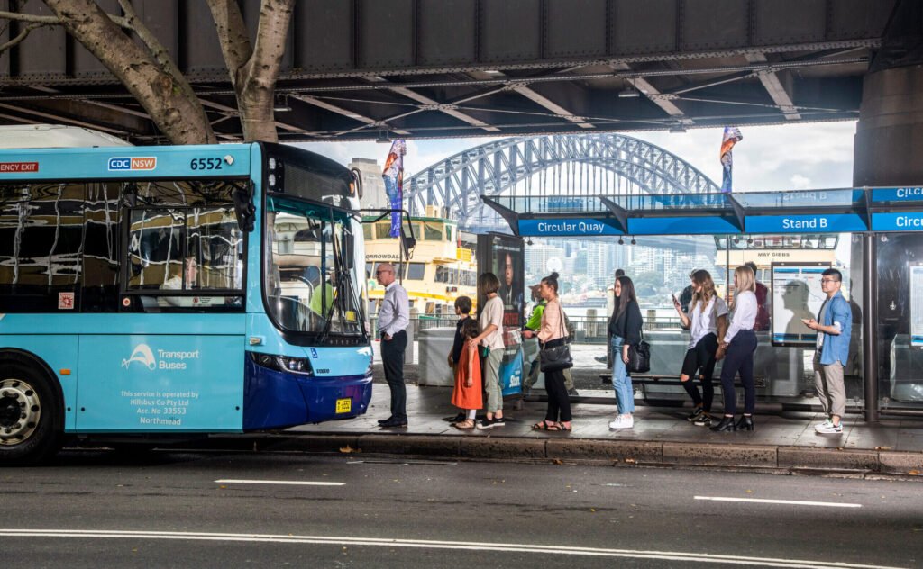 Passengers Waiting For Boarding A Bus