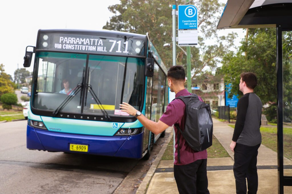 Passengers Waiting For A Bus