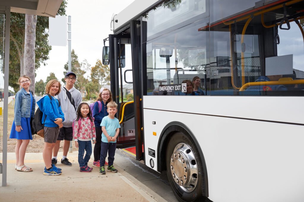 Children Getting Aboard School Bus